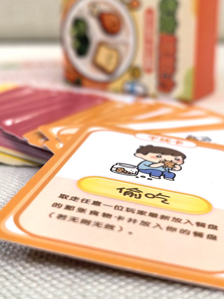 A page of the NutriEmpower rulebook showing a food card and its nutrition values