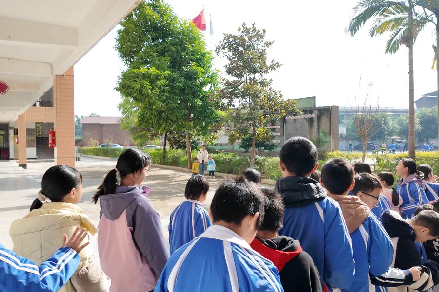 Pupils lined up in the playground of a rural primary school in Sichuan
